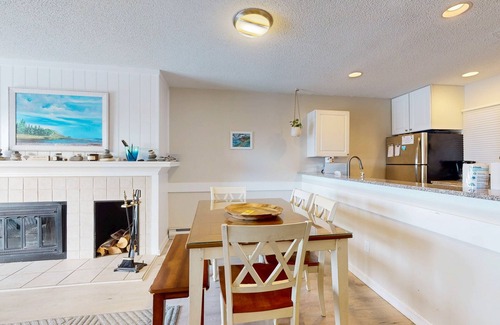 Maple City Condo | Riverview condo near the lake with beach access, fireplace, patio & cable