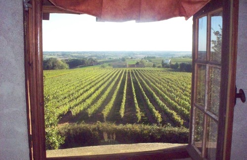 Coutures House | Romantic 18th-Century Windmill Retreat with Pool, Hot Tub & Panoramic Views