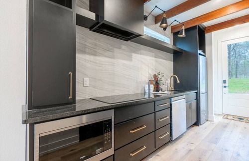 Bullard Cabin | Romantic Secluded Cabin with Private Waterfall, Hot Tub, Soaking Tubs & Fire Pit