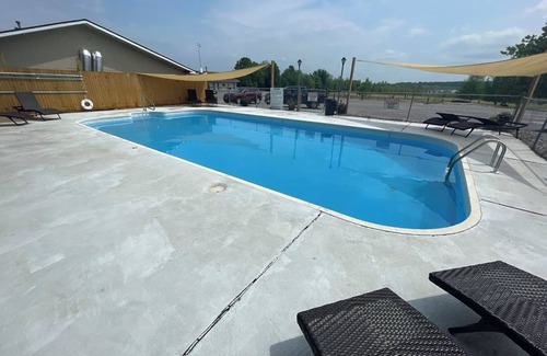 Warsaw House | Room Perfect for Family Gatherings w/Pool and Large Fishing Pond