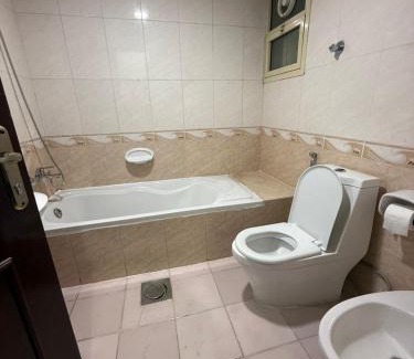 Madinat Zayed House | Room with toilet and tv for couple