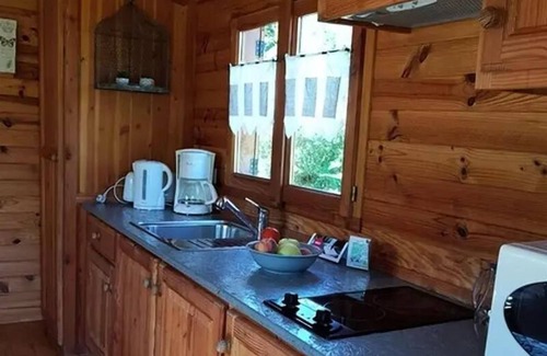 Saint-Paulien Cabin | Roulotte du Velay 18m2 + Terrace 15m2 4 Personen