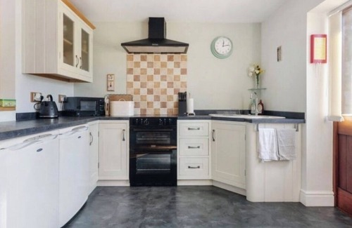 Westhouse House | Rural bungalow with field views, walks & wildlife: sleeps 2 adults. WiFi,Parking