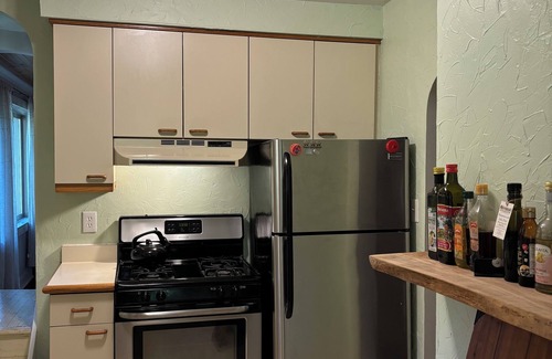 Level Green Cottage | Rustic 2BR 1BA Cottage w Porch!