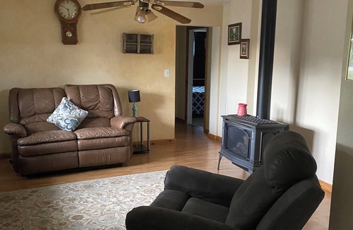 Worland House | Rustic Country 2-bedroom house with gas fireplace.