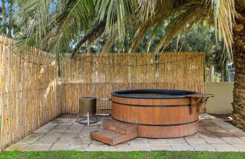 Helderberg Rural House | Rustic Farmhouse Retreat with Wood-Fire Hot Tub by Host Agents