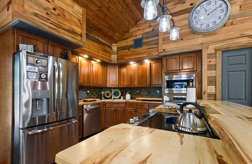 Sevierville Cabin | Rustic Hideaway 4 Bedroom Cabin by RedAwning