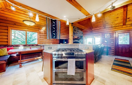 Oak Harbor Ski Chalet | Rustic waterview home, covered deck, vaulted ceilings & updated kitchen
