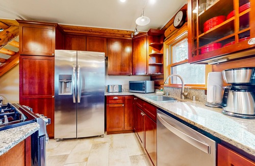 Oak Harbor Ski Chalet | Rustic waterview home, covered deck, vaulted ceilings & updated kitchen