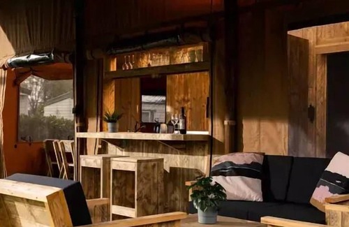 Cahagnolles House | Safari tent 49 m² with sanitary facilities + terrace 15 m² 6 persons