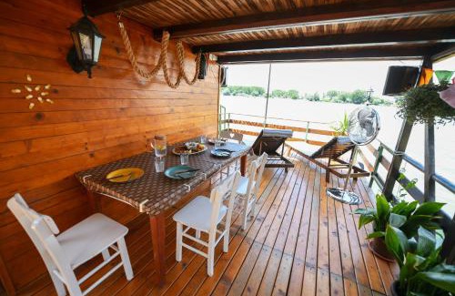 Cukarica Boat Rental | Sagando - Floating house on Sava river