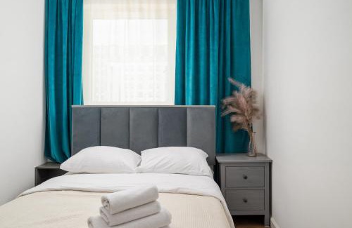 Bialoleka Apartment | Sage Green Luxury Apartment by BookingHost