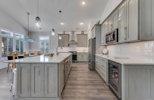 Kure Beach House | Salt Kured Upper - 3 Bedroom Upstairs Suite with access to a Large Backyard with