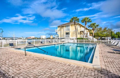 Holiday Isle Apartment | Sandpiper Cove Escape on Canal - Walk to Beach!