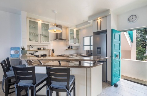 Shaka's Rock Apartment | Santorini Ballito | 180º Sea Views, Braai and Pool