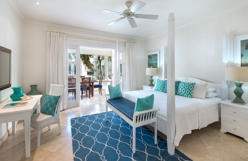 Schooner Bay Apartment | Schooner bay is a beachfront condominium with a freeform swimming pool as the focal point