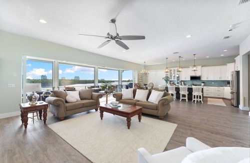 Bonita Springs House | Seafoam Serenity - Bayfront Retreat w/Dock, Pool & 1 Min Walk to Bonita Beach