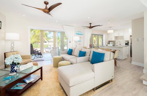Rum Point House | Seaside Dreams: Contemporary Oasis on Bio-Bay With Two Free Kayaks