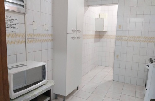 Vila Julia Apartment | SEASONAL APARTMENT IN GUARUJÁ ENSEADA - 10 MINUTES WALK FROM THE SEA - 2 BEDROOMS/GARAGE/WI FI