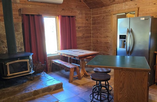 Stockton Cabin | Secluded Cabin - Hunt + Fish + Float Sac River/Stockton. Family and Pet Friendly