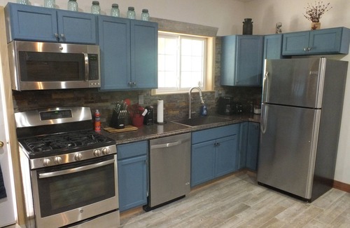 Peebles Cabin | Secluded Cabin in Amish Country! Relax by the Pond & Firepit on 6 Private Acres!