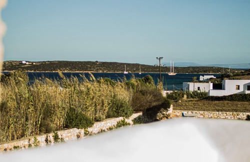 Paros Villa | "Secluded Elegance: Three-Level Villa with Ocean Views, Pool, and Outdoor Oasis"