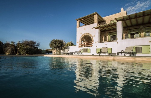 Paros Villa | "Secluded Elegance: Three-Level Villa with Ocean Views, Pool, and Outdoor Oasis"