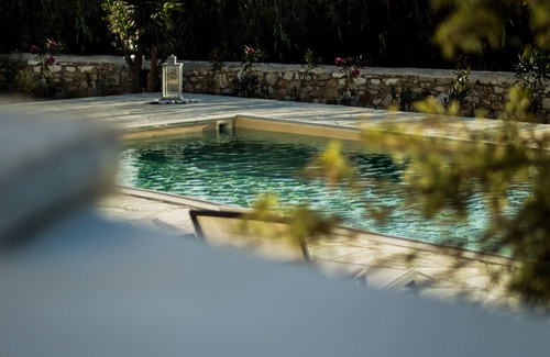Paros Villa | "Secluded Elegance: Three-Level Villa with Ocean Views, Pool, and Outdoor Oasis"