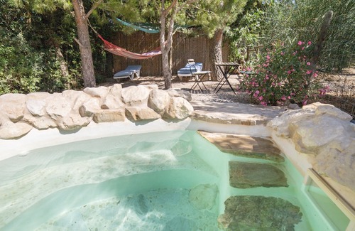 Villanueva del Trabuco Apartment | Secret garden rock pool retreat vacation home with shared pool and WiFi