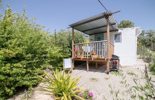 Villanueva del Trabuco Apartment | Secret garden rock pool retreat vacation home with shared pool and WiFi