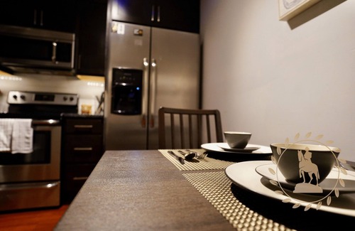 Downtown Baltimore Apartment | Secure Condo w/Paid Garage Parking, Free WiFi and Monthly Discounts - UB & MICA