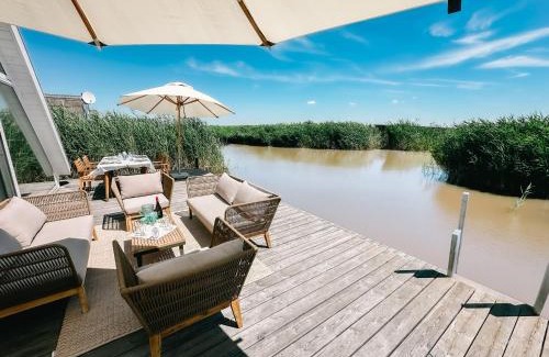 Rust House | Seehütte Sonnenschilf - Premium Hide-Away Ferienhaus in Rust direkt am Neusiedlersee