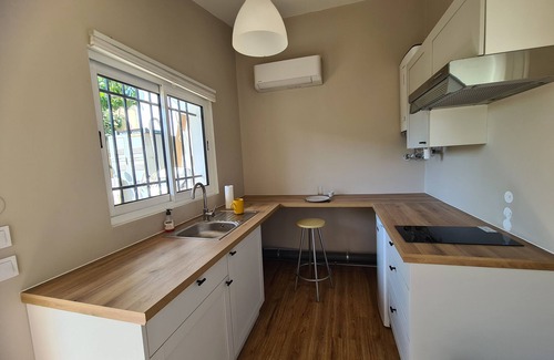 Corneilla-del-Vercol Apartment | Self-contained accommodation with trees, terrace and outdoor area close to the beach.