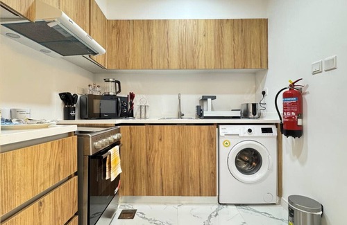 Masdar City Apartment | Serene 2BR Getaway in Masdar City | Pool & Balcony