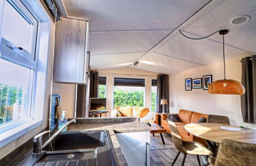 Hollum Ski Chalet | Serene Dune Chalet located between Golf Course and Beach