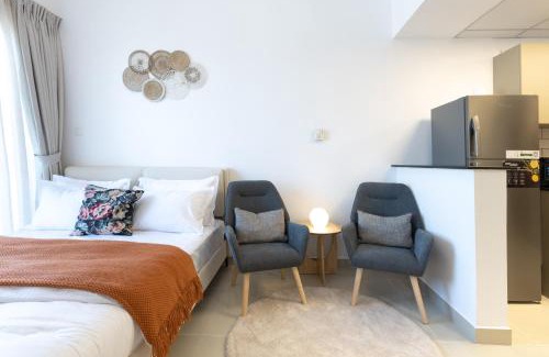 Jumeirah Village Circle Apartment | Serene studio apartment with Burj Khalifa view in Jumairah Village Circle JVC