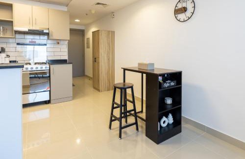 Jumeirah Village Circle Apartment | Serene studio apartment with Burj Khalifa view in Jumairah Village Circle JVC