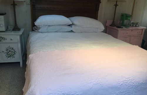 L'Anse Hotel | Serenity Room located inside the Ivory Mansionn