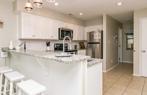 Surf City House | Shangri La - 2BR Turtle Cove Townhouse Near Pool