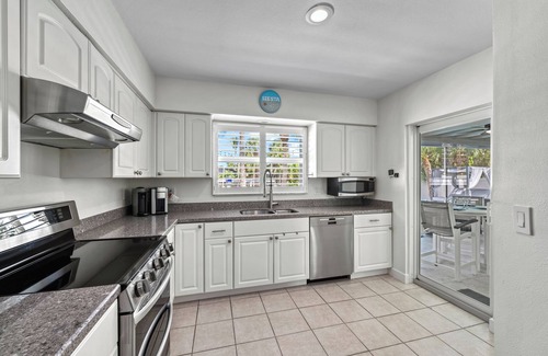 Siesta Key Village House | Siesta Key Waterfront Oasis - Heated Pool, Dock, Walk to Village & Beach