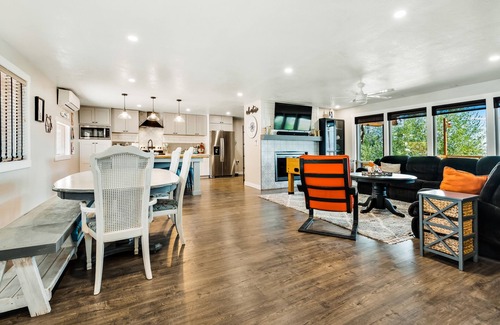 Fish Haven House | Single-level, lakefront getaway with mini-bar, furnished deck & mountain views
