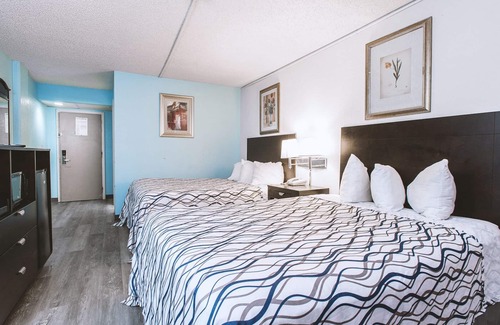Wichita House | Sky-Palace Inn & Suites Wichita East - Comfort Suite 2 Queen Bed NS Oversized
