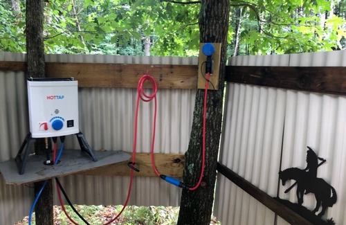 Ironto RV Rental | Sleep under the trees in a Native American Tipi - off-grid glamping experience!