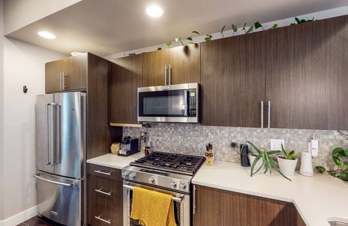 West Colfax House | Sloan Lake’s Rooftop Oasis | House with rooftop patio, firepit, hot tub, grill