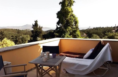 Douliana House | Small village house, shared pool and views of the countryside and sea