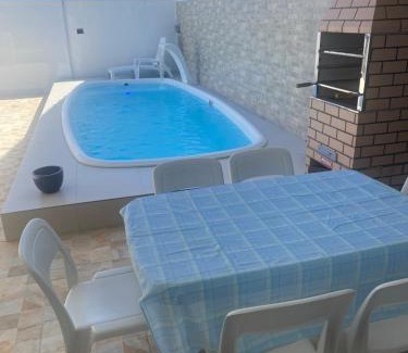 Jardim Virginia House | Sobrado com piscina e área gourmet na praia da Enseada