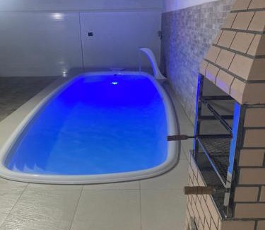 Jardim Virginia House | Sobrado com piscina e área gourmet na praia da Enseada