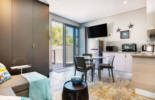 Camps Bay Apartment | Solar Powered Breathtaking Sea Views of Camps Bay with Private Outdoor Terrace.