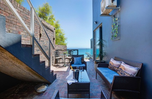Camps Bay Apartment | Solar Powered Breathtaking Sea Views of Camps Bay with Private Outdoor Terrace.