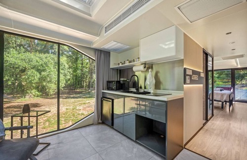 St. Stephen House | Space-Age Glamping Oasis - Immerse Yourself in Nature Without Sacrificing Comfort